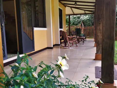 The covered terrace along the house — Main house, Rio Ángel Bio-reserve