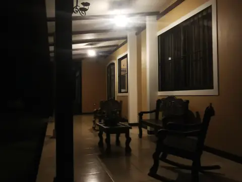 The veranda at night — Main house, Rio Ángel Bio-reserve