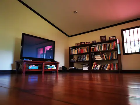 The bookshelves in the living room — Main house, Rio Ángel Bio-reserve