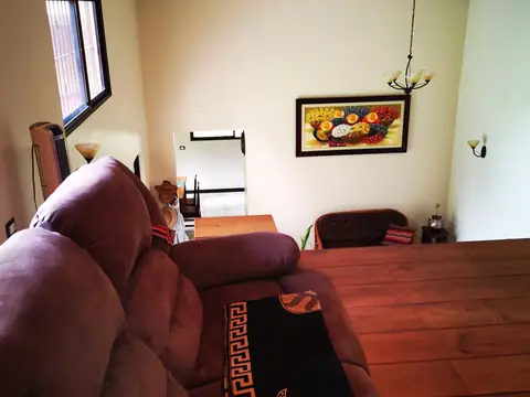 Seating by the bookshelves — Main house, Rio Ángel Bio-reserve