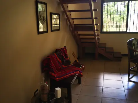 The staircase to the upper floor — Main house, Rio Ángel Bio-reserve