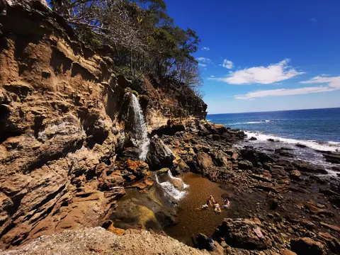 A waterfall by the coast — Beaches and ocean, Rio Ángel Bio-reserve